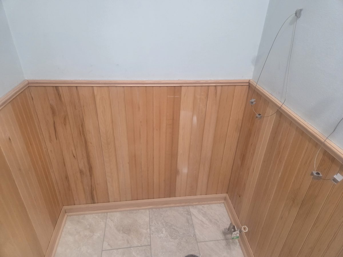 Bathroom after wood paneling installation